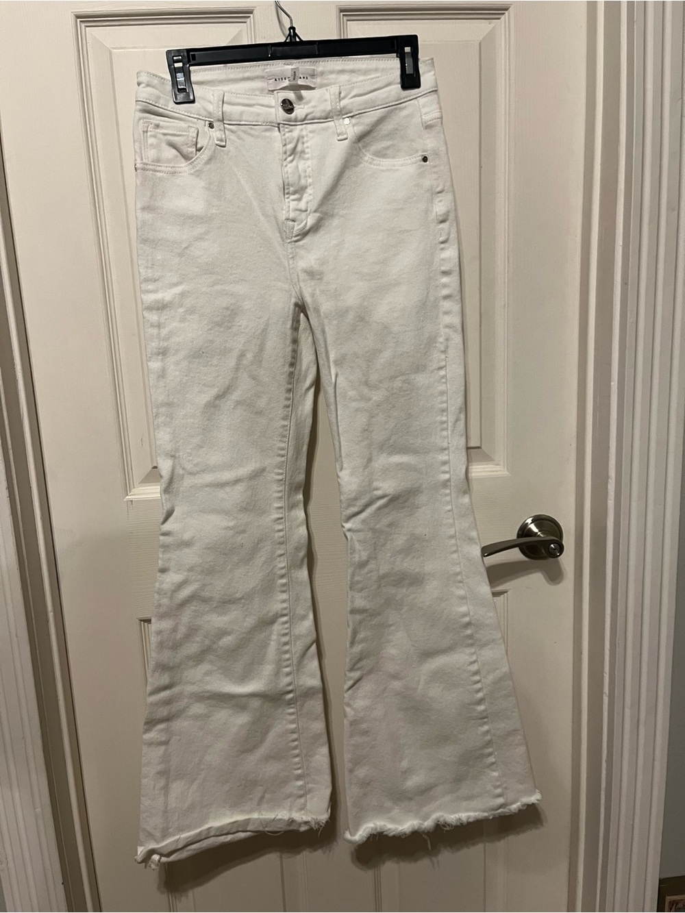 High-Rise White Flare Jeans with Raw Hem